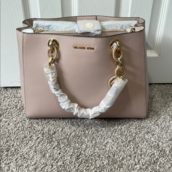 Michael Kors Handbags - NWT Michael Kors Pink Bag with Gold Accents